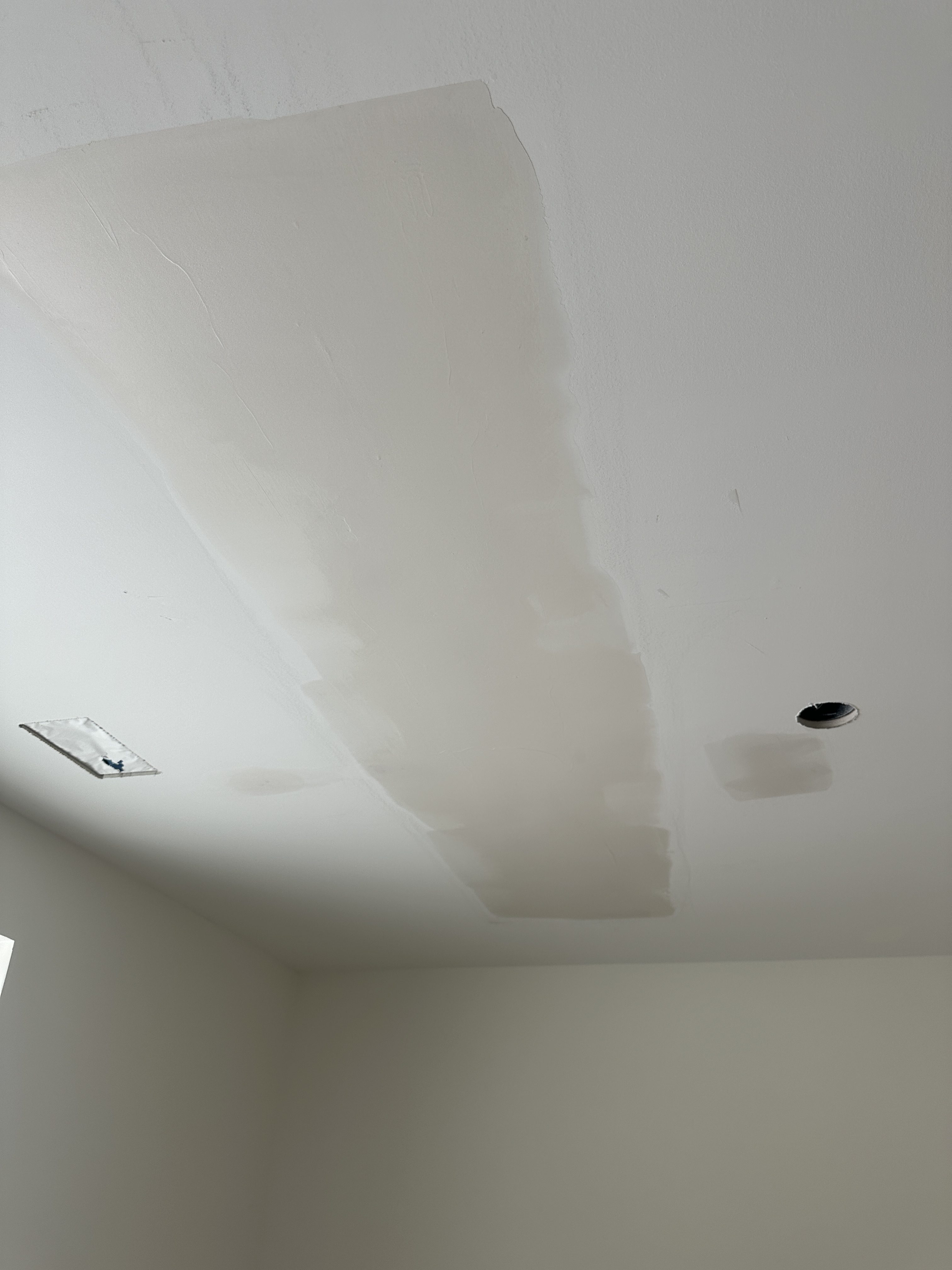 After — Finished ceiling drywall repair in Bellevue WA